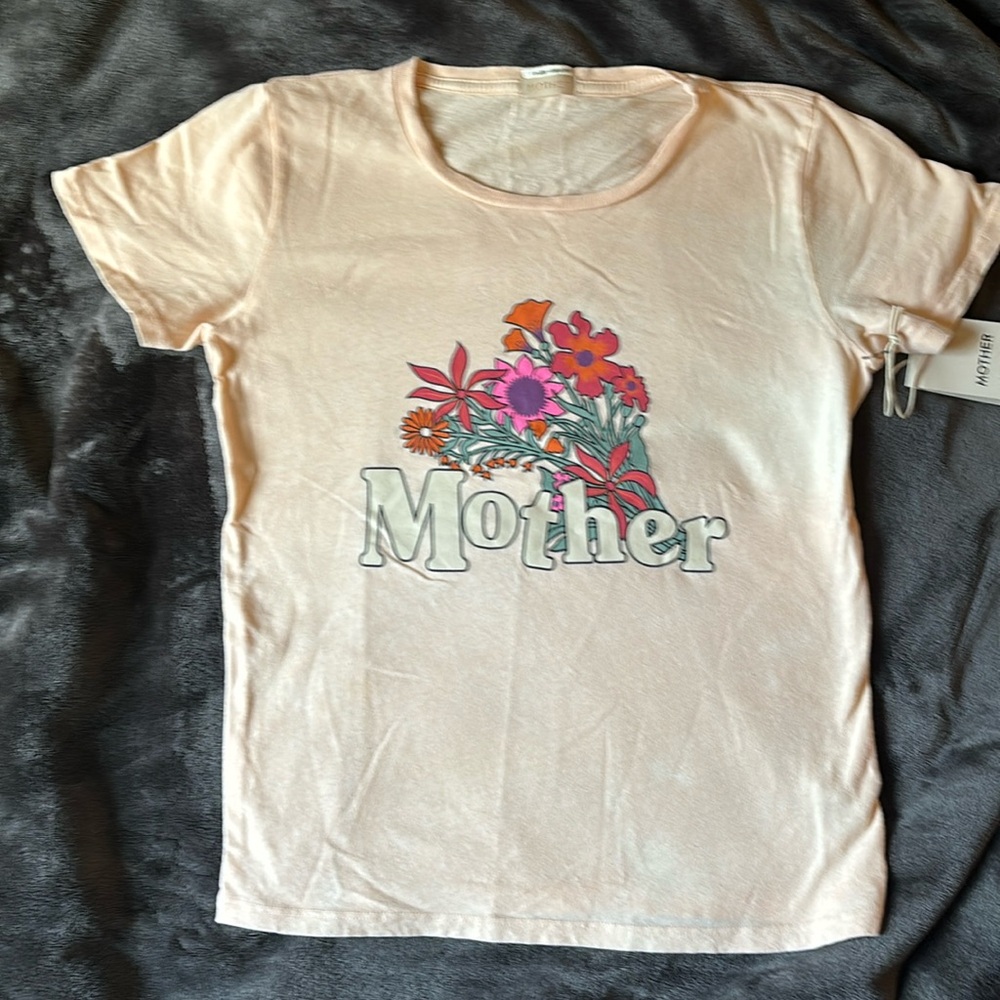 Mother tee xs. Discoloration at bottom of shirt (see photos). Never worn.